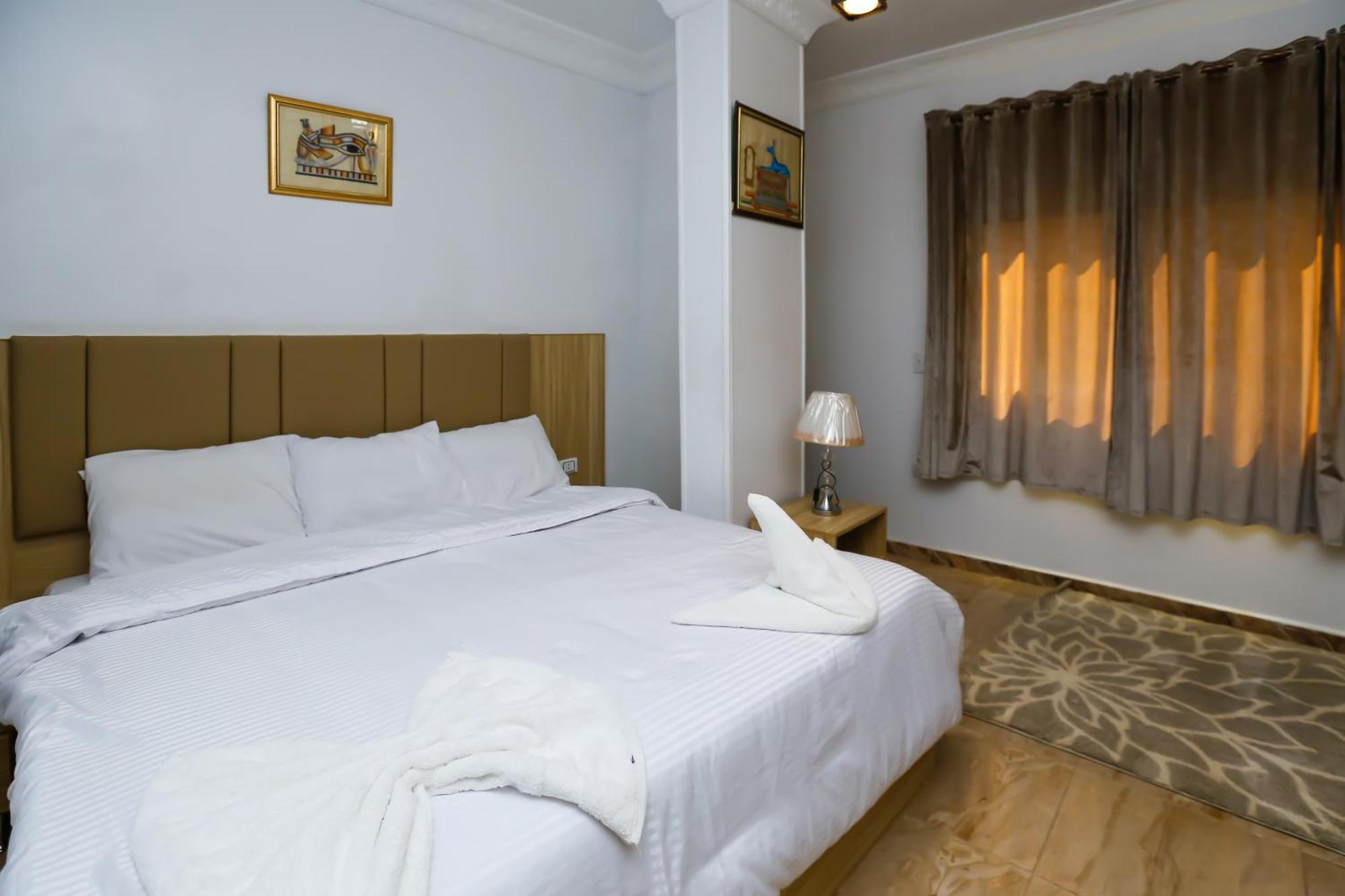 Pyramids Express View Hotel Kafret el-Gabal Extérieur photo