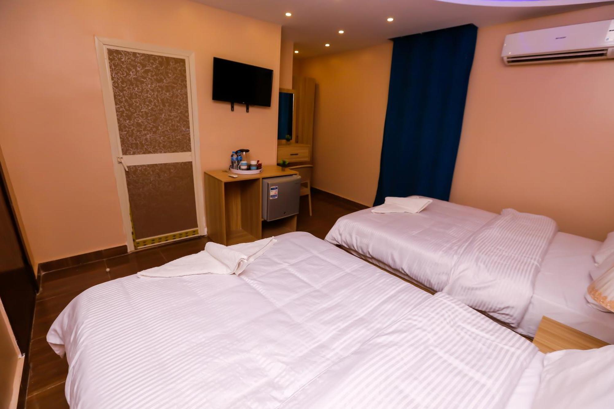 Pyramids Express View Hotel Kafret el-Gabal Extérieur photo