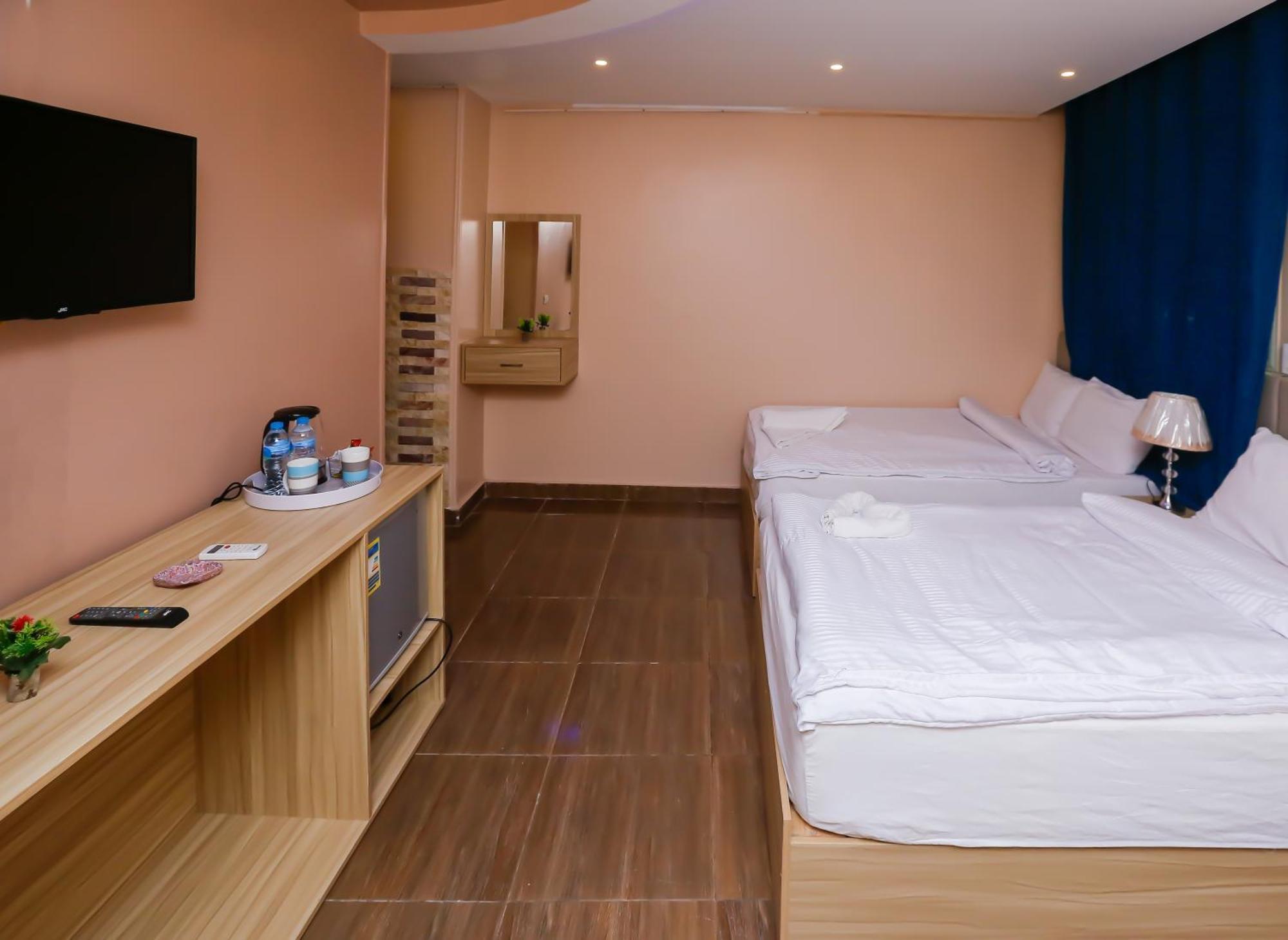 Pyramids Express View Hotel Kafret el-Gabal Extérieur photo